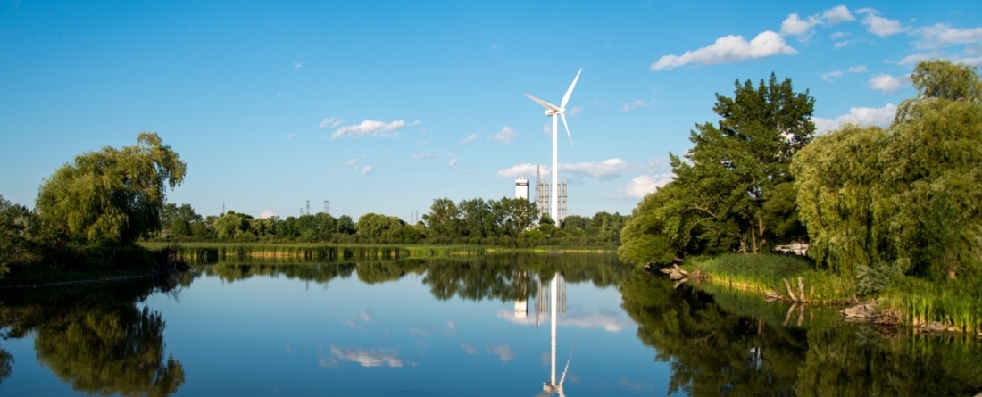 picture of wind mill over a lake