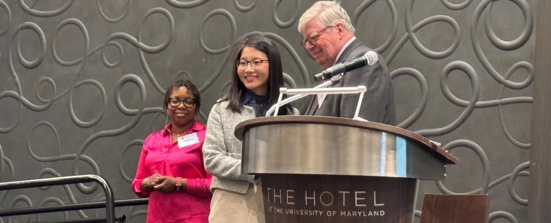picture of Ryna Cui accepting the Exemplary Researcher award at the University of Maryland Research Excellence Celebration